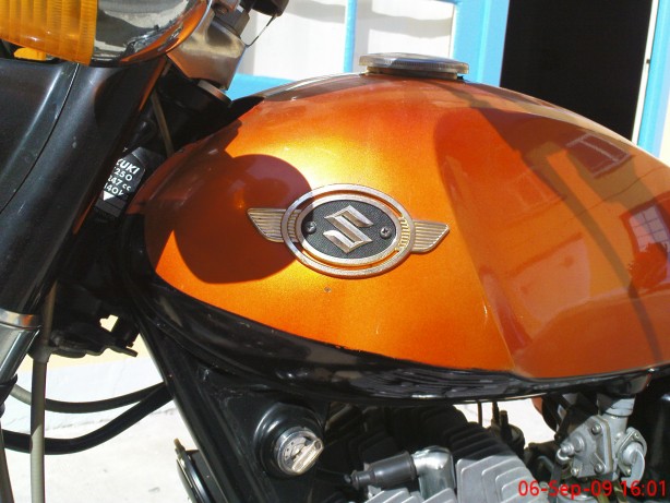 Winged Suzuki logo tank badges